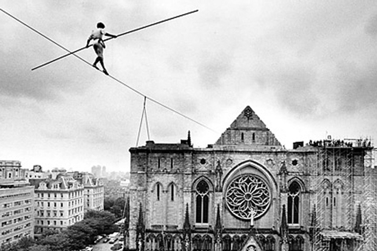 Aerialist Philippe Petite opens dedication of St.John The Divine. Credit: Fred R. Conrad / The New York Times, 1982